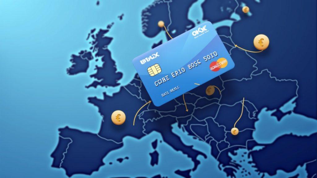 OKX payment card hovering over a Europe map with USDC and EUR icons, symbolizing regulated stablecoin payments in the EEA.
